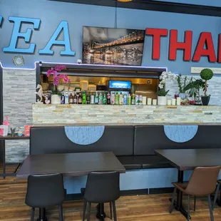 the bar and seating area of the restaurant