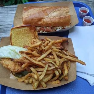 Honey mustard chicken cutlet, side order of fries, kielbasa sandwich
