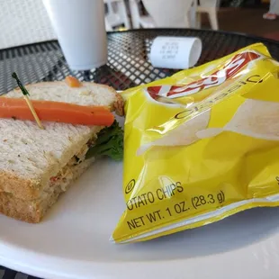 Half tuna sandwich w/pickled carrot and chips...nice light lunch