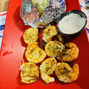 Stuffed shrimps with crab (choice of two sides). I got baked potato and side salad.