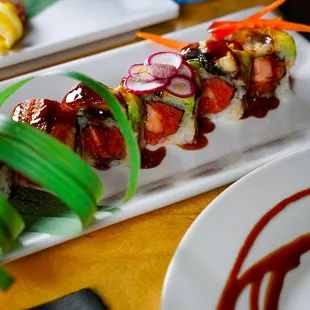 DRAGON ROLL
 
 salmon tempura, spicy tuna, with avocado &amp; eel on top