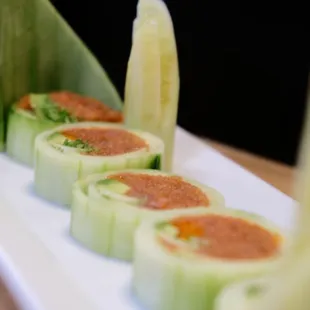 THE HOTTIE 
 
 spicy tuna, gobo, avocado, scallions in a cucumber wrap