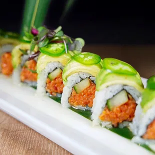 911 spicy tuna with cucumber topped with avocado, jalapeno &amp; sweet yuzu sauce