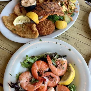 Seafood Feast (crab cake, boiled shrimp, fried fish, blackened fish, fried shrimp, fries and veggies) $29.99