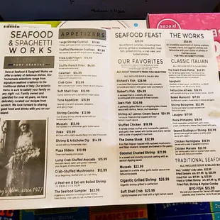 a menu for seafood and spaghetti works