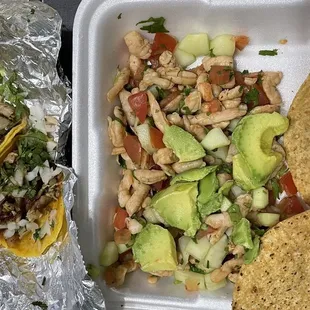 a meal in a styrofoam container