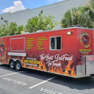 a food truck parked in a parking lot