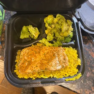 Garlic herb salmon with steamed broccoli