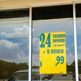 a sign in the window of a restaurant