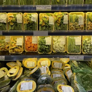 a variety of vegetables in plastic containers