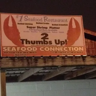 a sign on the roof of a restaurant
