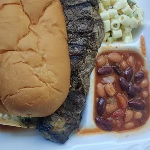 Ribeye steak sandwich and macaroni salad