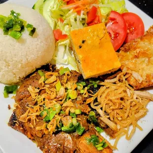 Broken rice with pork chop, egg cake..