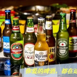 a variety of beer bottles on a table