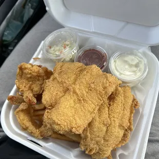 Cornmeal battered fish and shrimp with fries and coleslaw