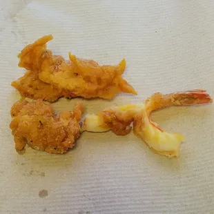 Greasy rubbery shrimp.  Excessive amount of batter.