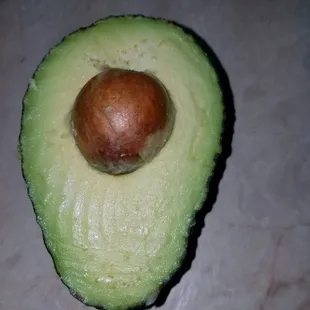 an avocado cut in half