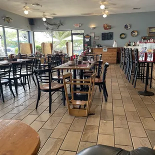 All the tables were dirty and left over food on them.