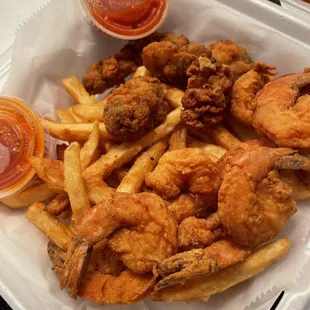 Create your own platter: 8 shrimp, 4 oz oysters and fries