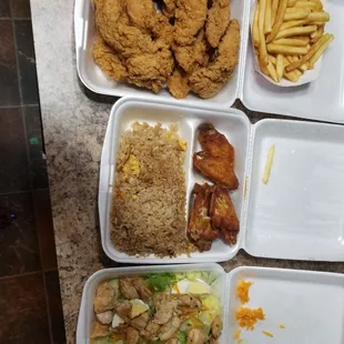 a variety of food items in trays