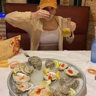 The amazing oysters washed down with a blue moon beer