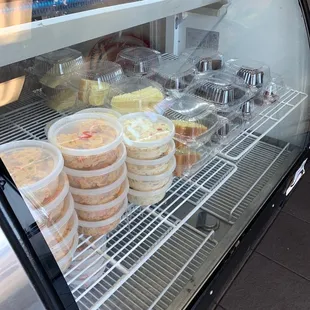 a display case filled with food
