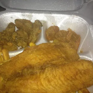 fish and fries in a styrofoam container