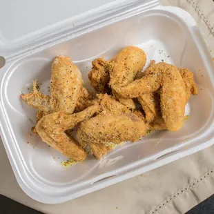 a container of fried chicken