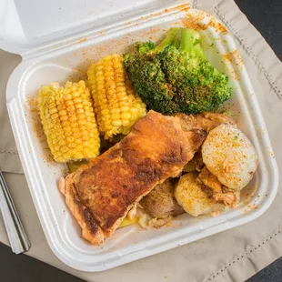 a meal in a styrofoam container