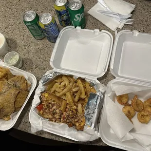 Fried fish platter (left), salmon cheese steak combo (middle), fried shrimp (right)