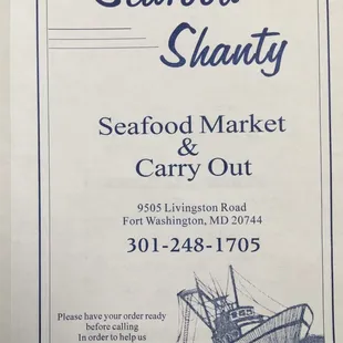 a sign for seafood market and carry out