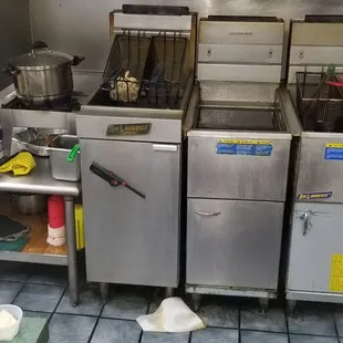 The fryers. Clean underneath.
