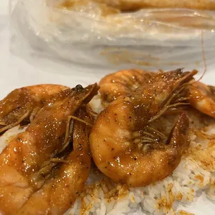 a plate of shrimp and rice