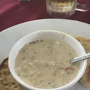 a bowl of soup and bread