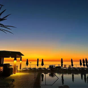 Sunset at the pool outside the restaurant