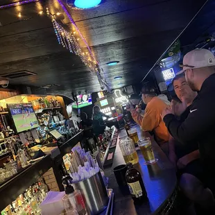 people sitting at the bar