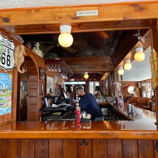 a man sitting at a bar