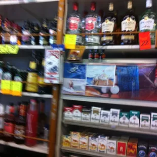 a shelf full of liquor