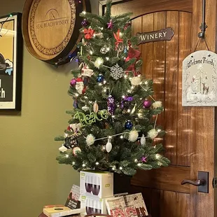 a christmas tree with wine glasses