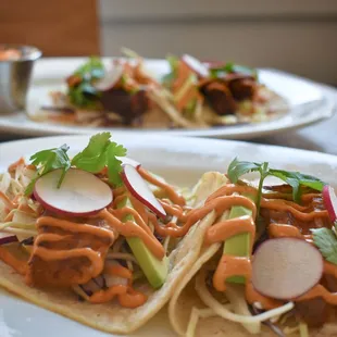 two tacos on a plate
