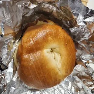 a bagel wrapped in tin foil