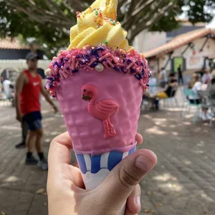 Birthday cake ice cream with a fancy cone