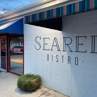 the entrance to a restaurant