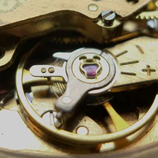 Balance, hairspring, jewels, shock system