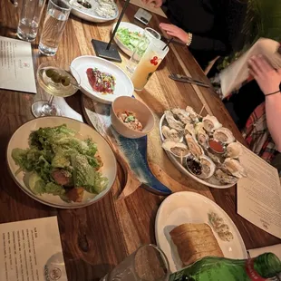 Oysters, ahi tuna, ceviche, salad