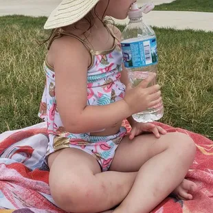 There aren't many chairs available. So we took up space on the grass.