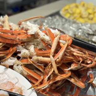 a large pile of crab legs