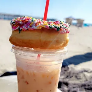 a cup of iced coffee with sprinkles