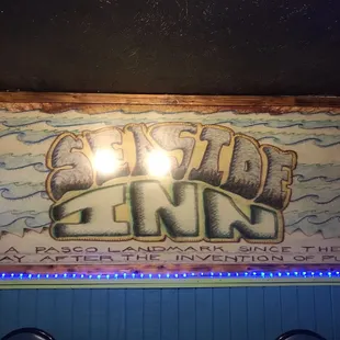 the sign above the bar