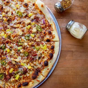 Luau Pizza: BBq sauce, Chicken, Bacon, Pineapple, Onions, And Jalapeno